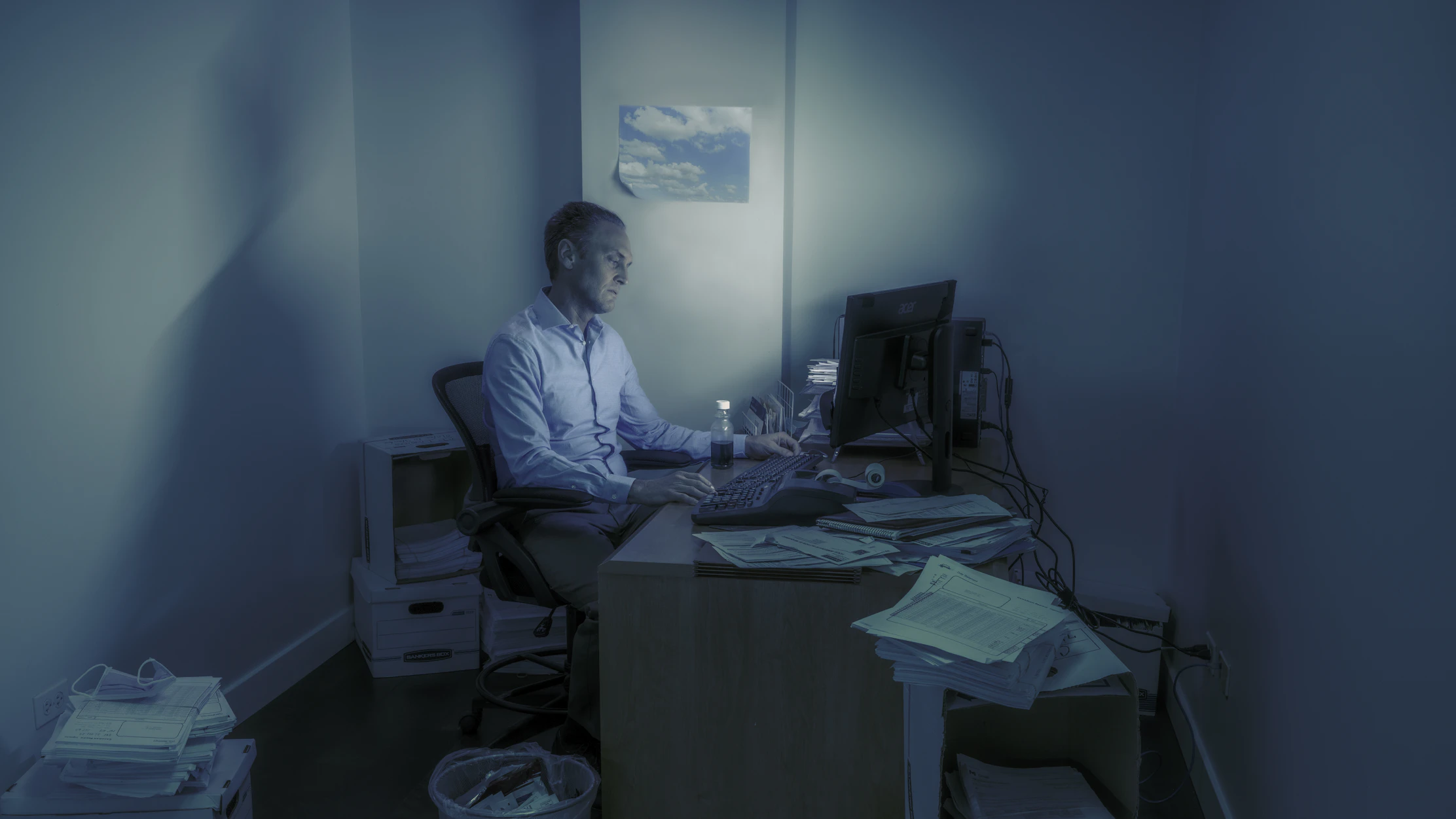 Ernest in His Office at the Trucking Company